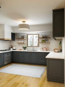 Bright kitchen with dark gray cabinets and subway tile.